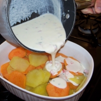 Image of Orange And Gold Potatoes Au Gratin Recipe, Group Recipes